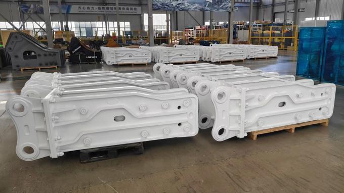Painted hydraulic breaker housings prepared in a workshop