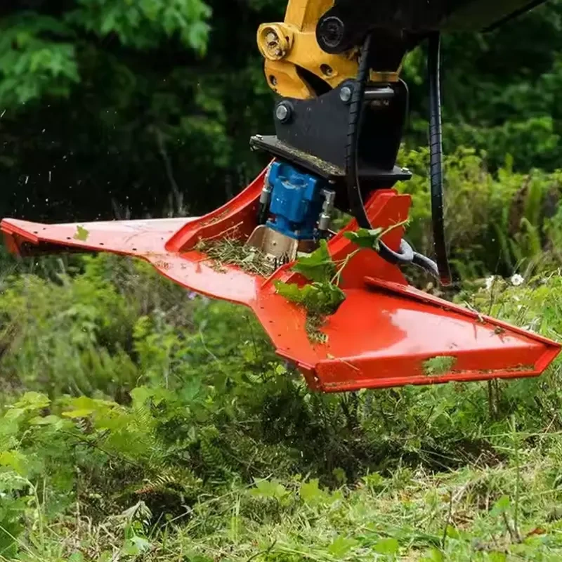 Excavator-mounted rotary cutting deck working in vegetation