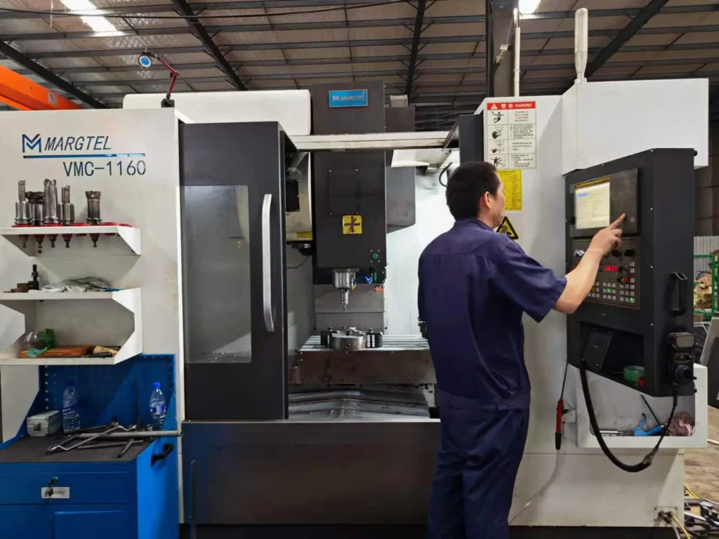 Operator at a machining centre used for hydraulic components