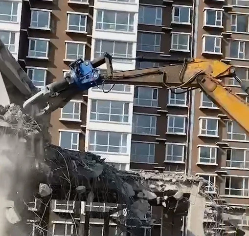 Concrete demolition with an excavator-mounted concrete cutter