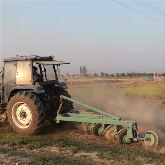Soil ploughing with a mounted disc plough