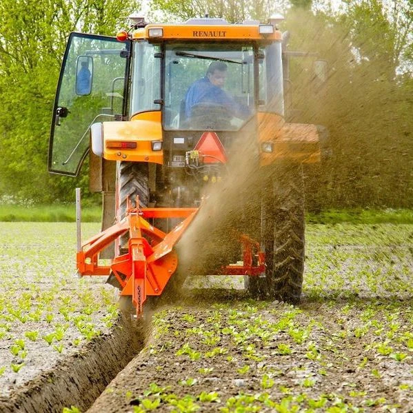 Drainage-ditch cutting with a tractor-mounted rotary ditcher