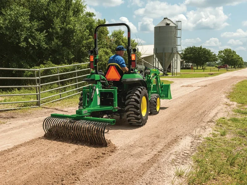 Gravel-surface preparation with a landscape rake