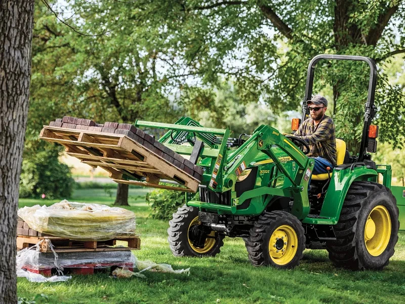 Pallet handling with tractor-loader forks