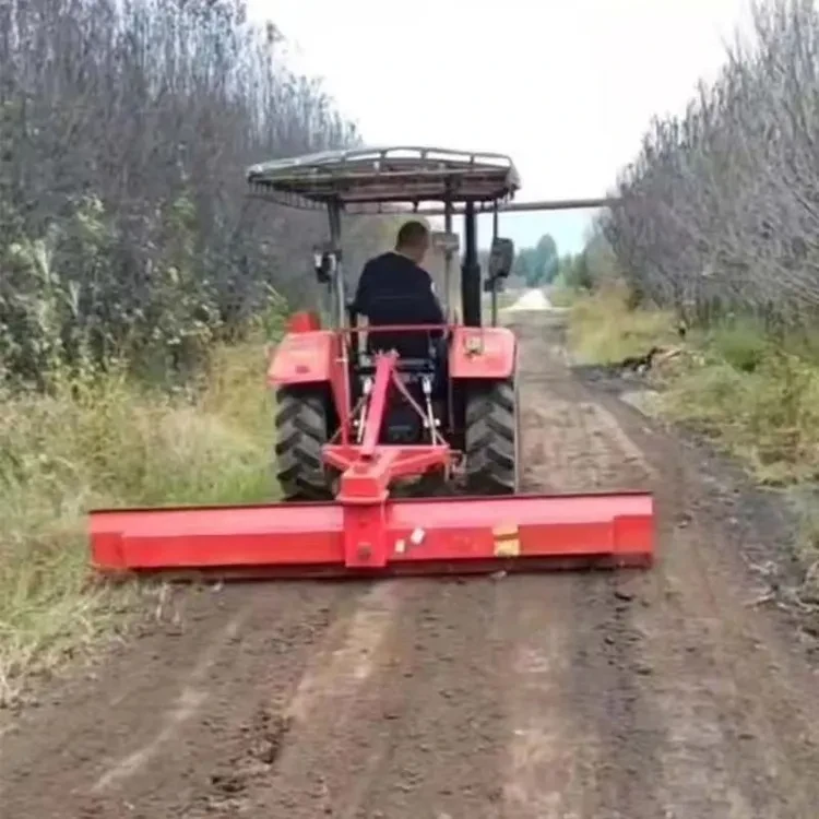 Farm-track grading with a rear-mounted blade