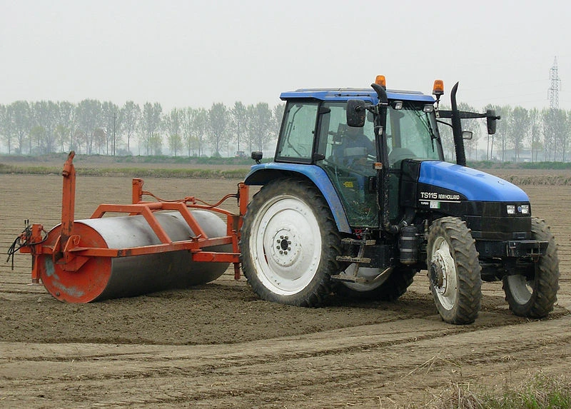 Soil consolidation with a towed roller