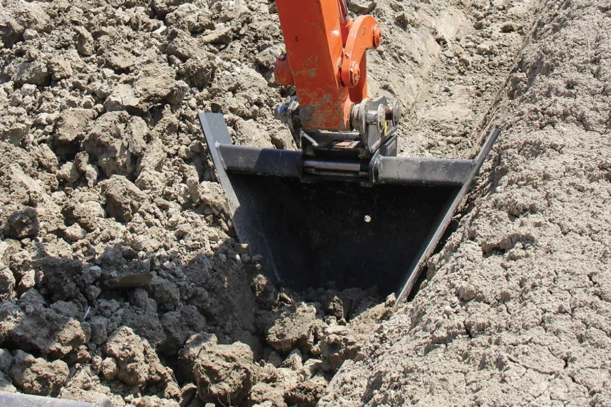 V-shaped ditch excavation with a trapezoidal bucket